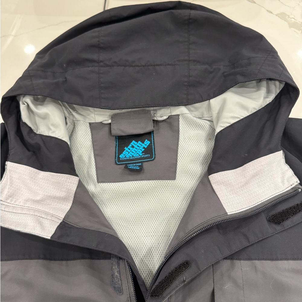 Waterproof, wind proof, breathable shell w hood and pit zippers.